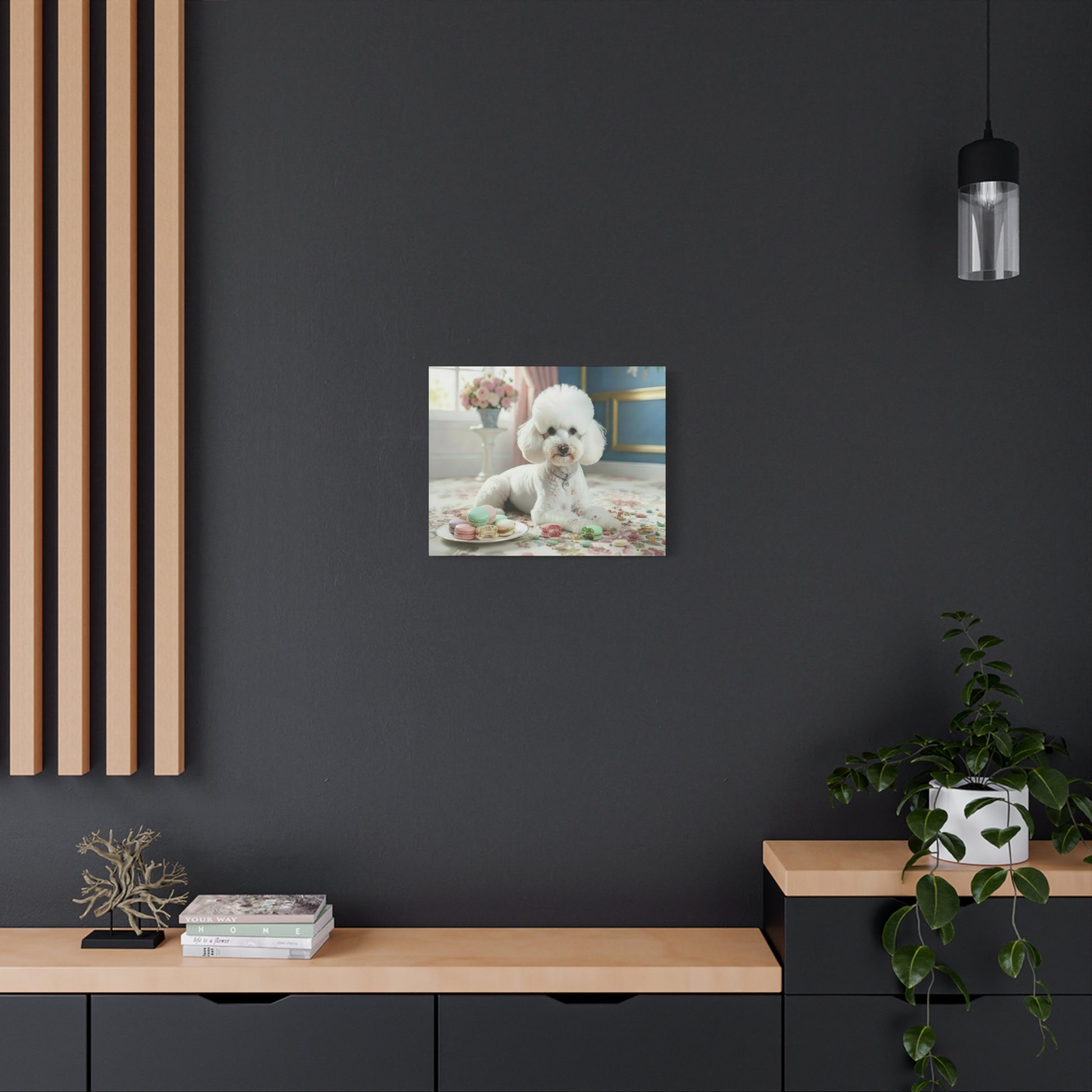 Canvas print of a dog on a dark wall above a wooden shelf.