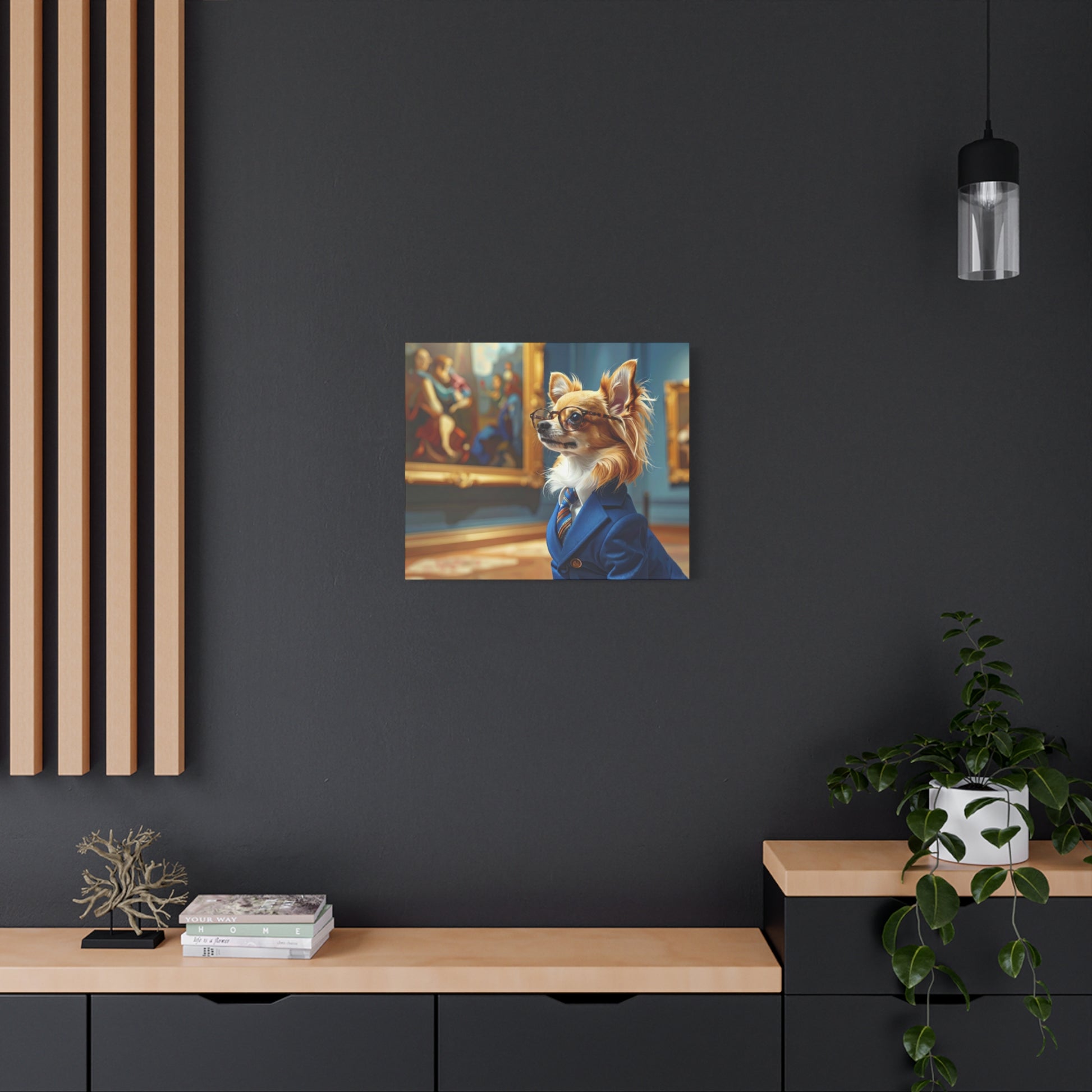A Chihuahua in a suit and glasses looking at art.